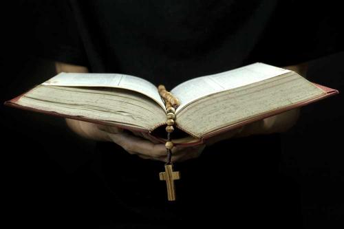 bible with rosary